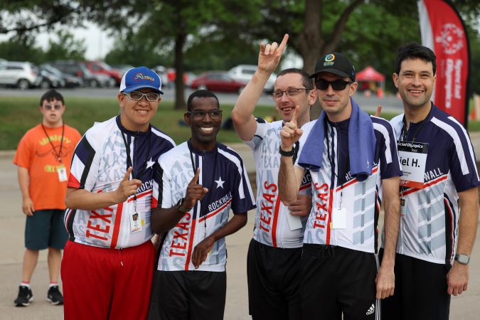 Special Olympics athletes celebrating their wins. 